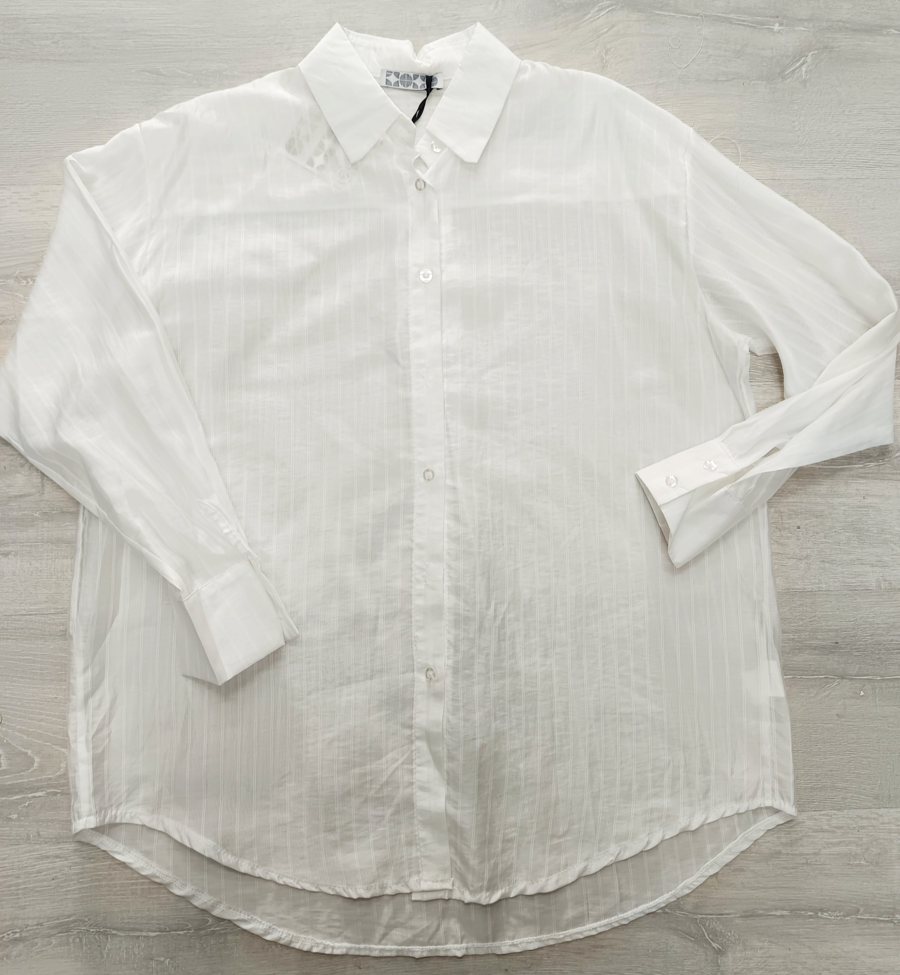 Camisa semitransparente