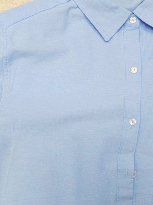 Camisa oversize con corte a los lados