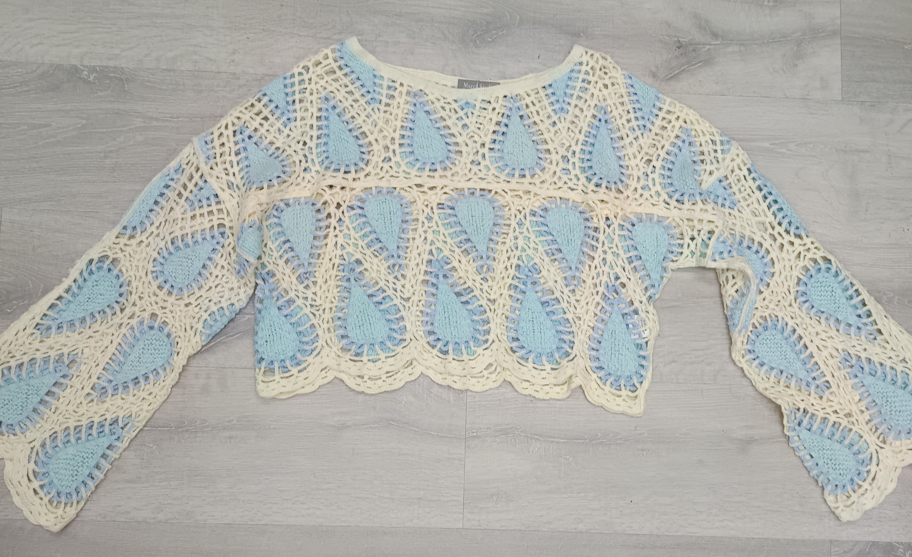 Jersey crochet manga acampada