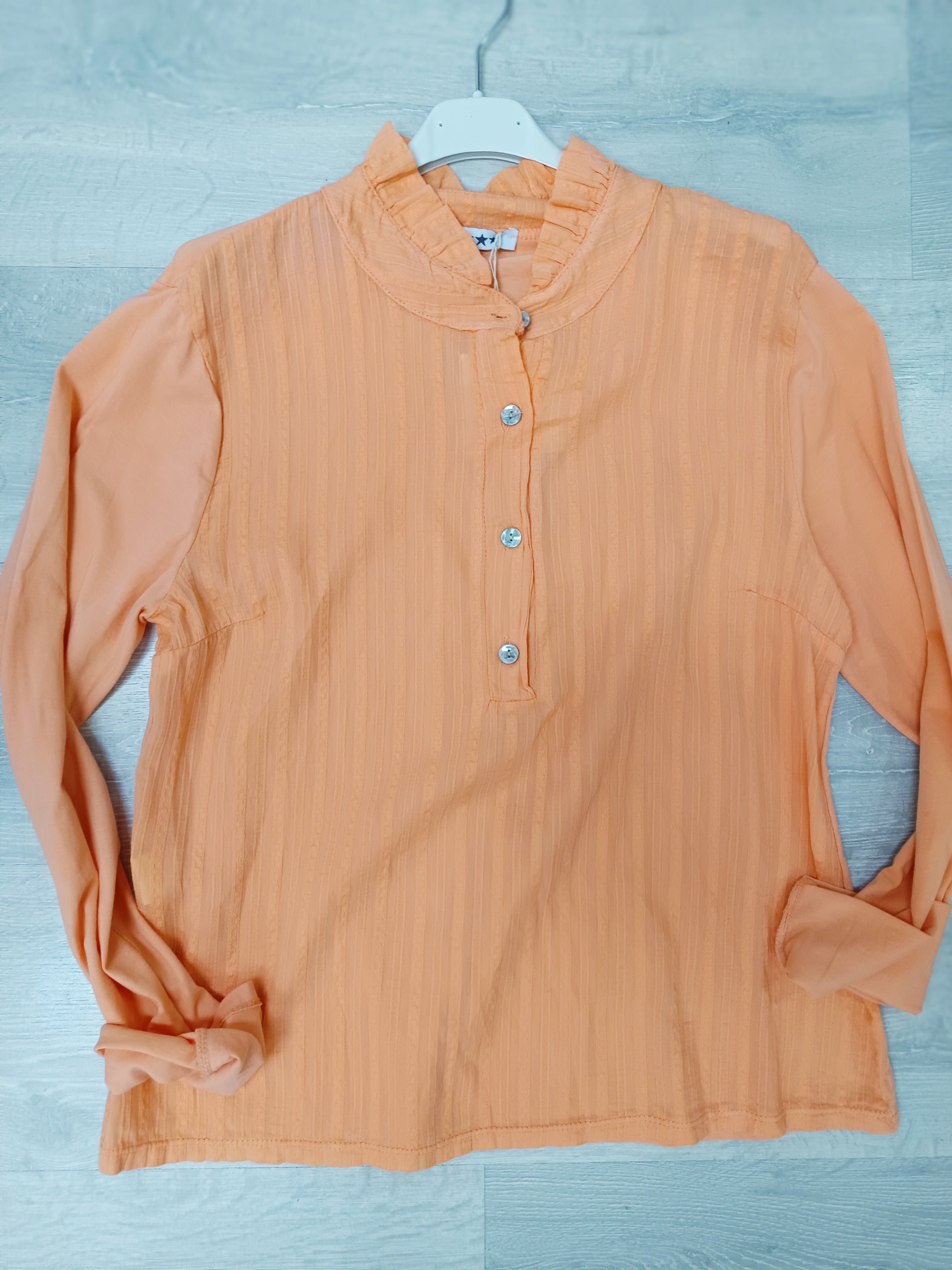 Blusa combinada con mangas de camiseta