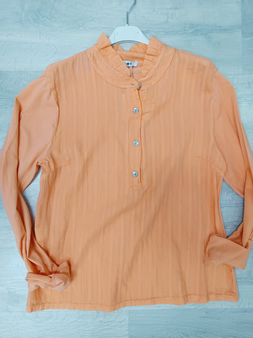 Blusa combinada con mangas de camiseta