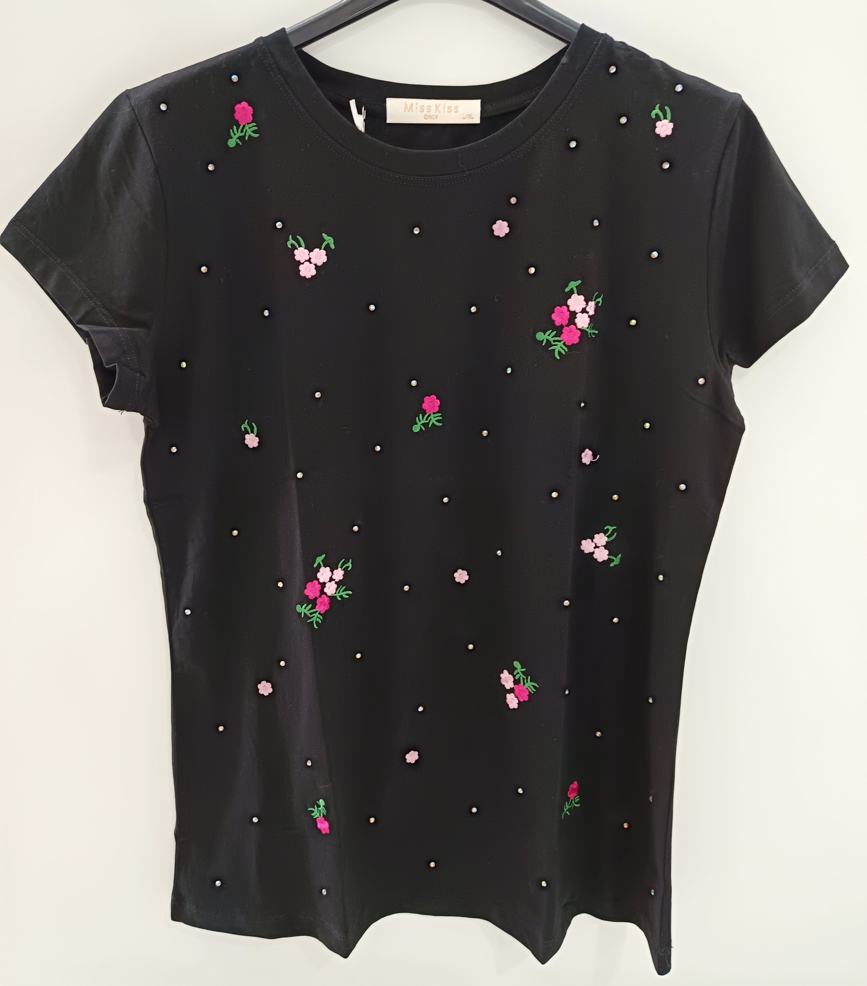 Camiseta bordada con flores y strass