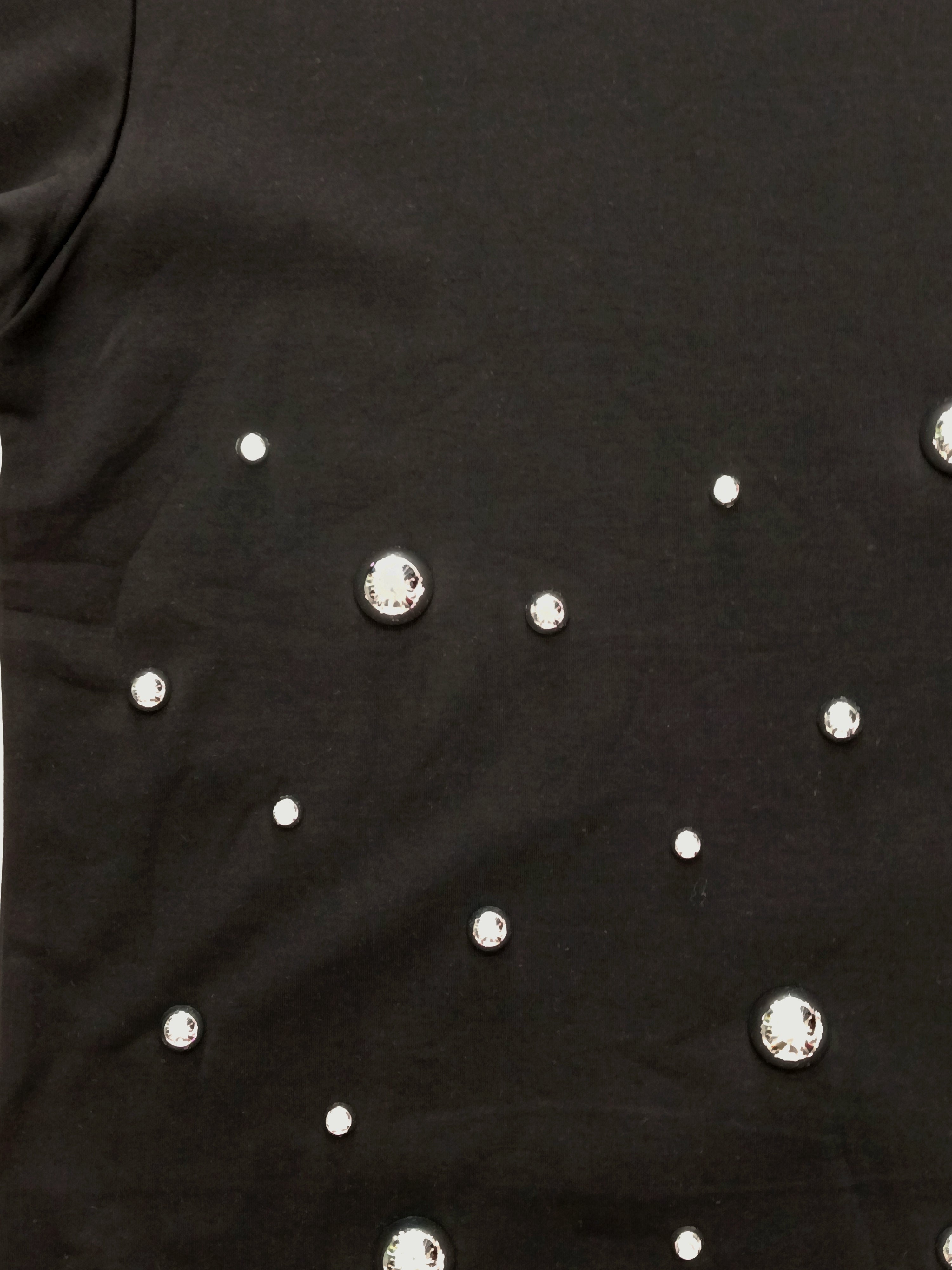 Camiseta oversize detalle bolas plateadas