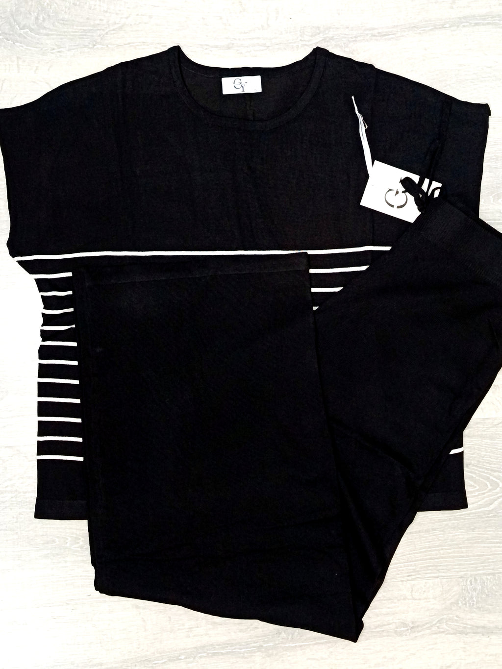 Conjunto punto a rayas