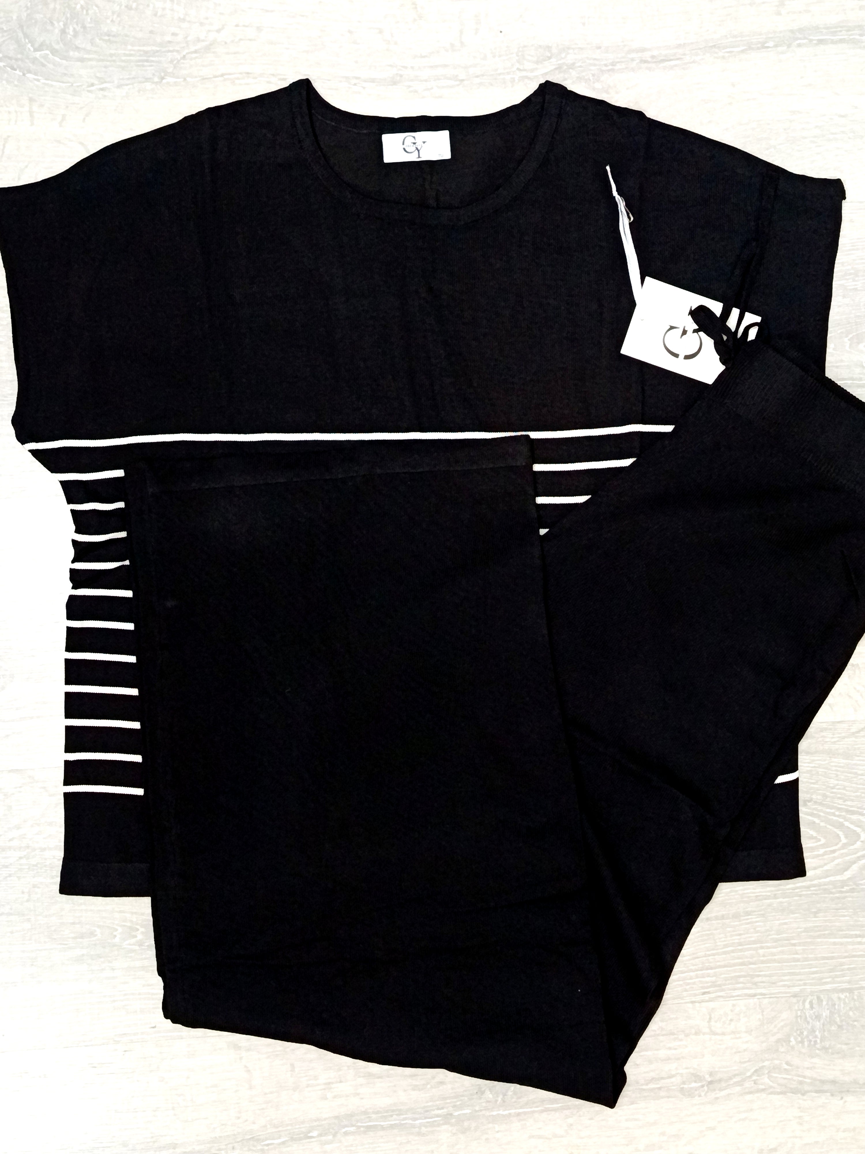 Conjunto punto a rayas