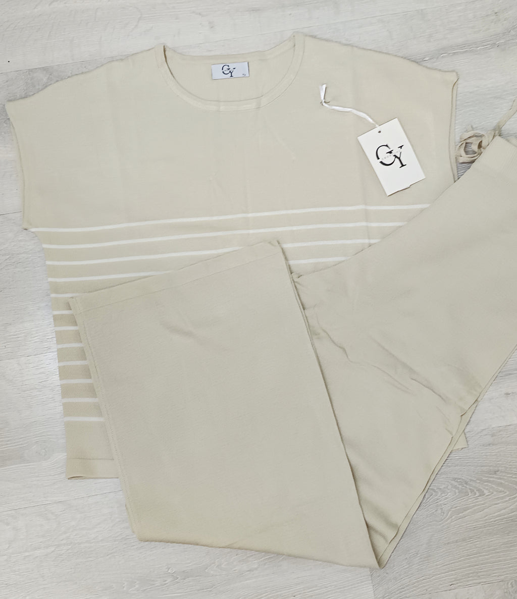 Conjunto punto a rayas