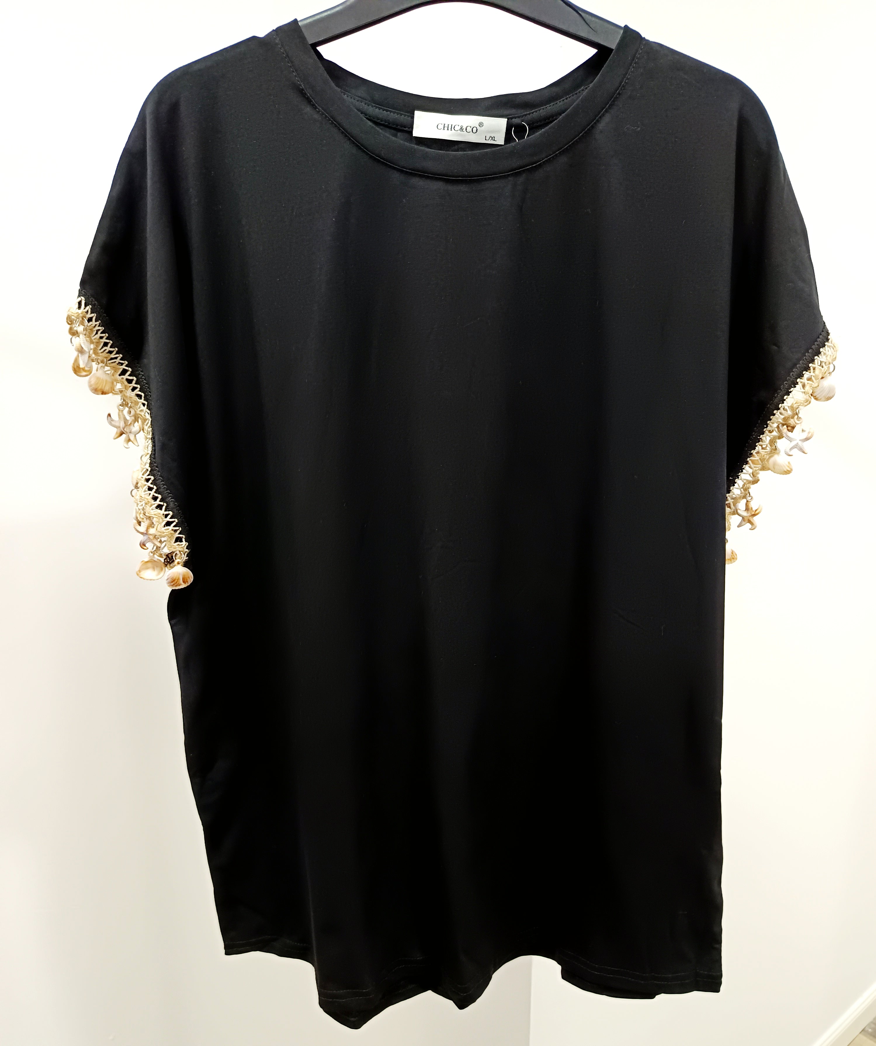 Camiseta adorno conchas