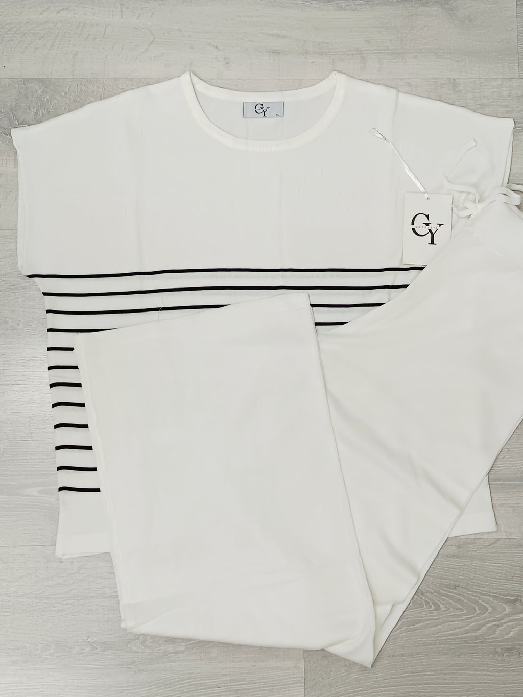 Conjunto punto a rayas