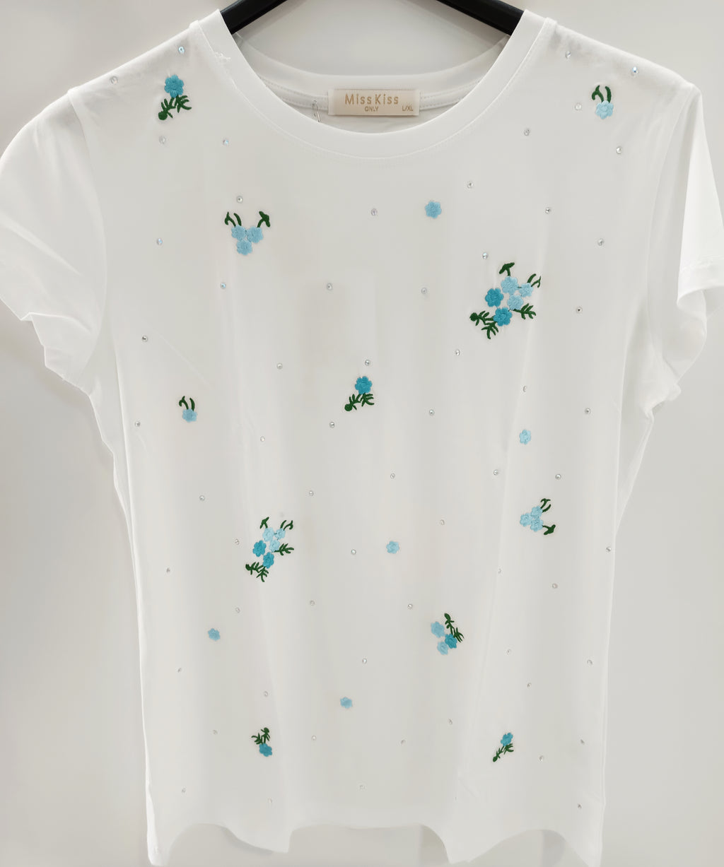 Camiseta bordada con flores y strass