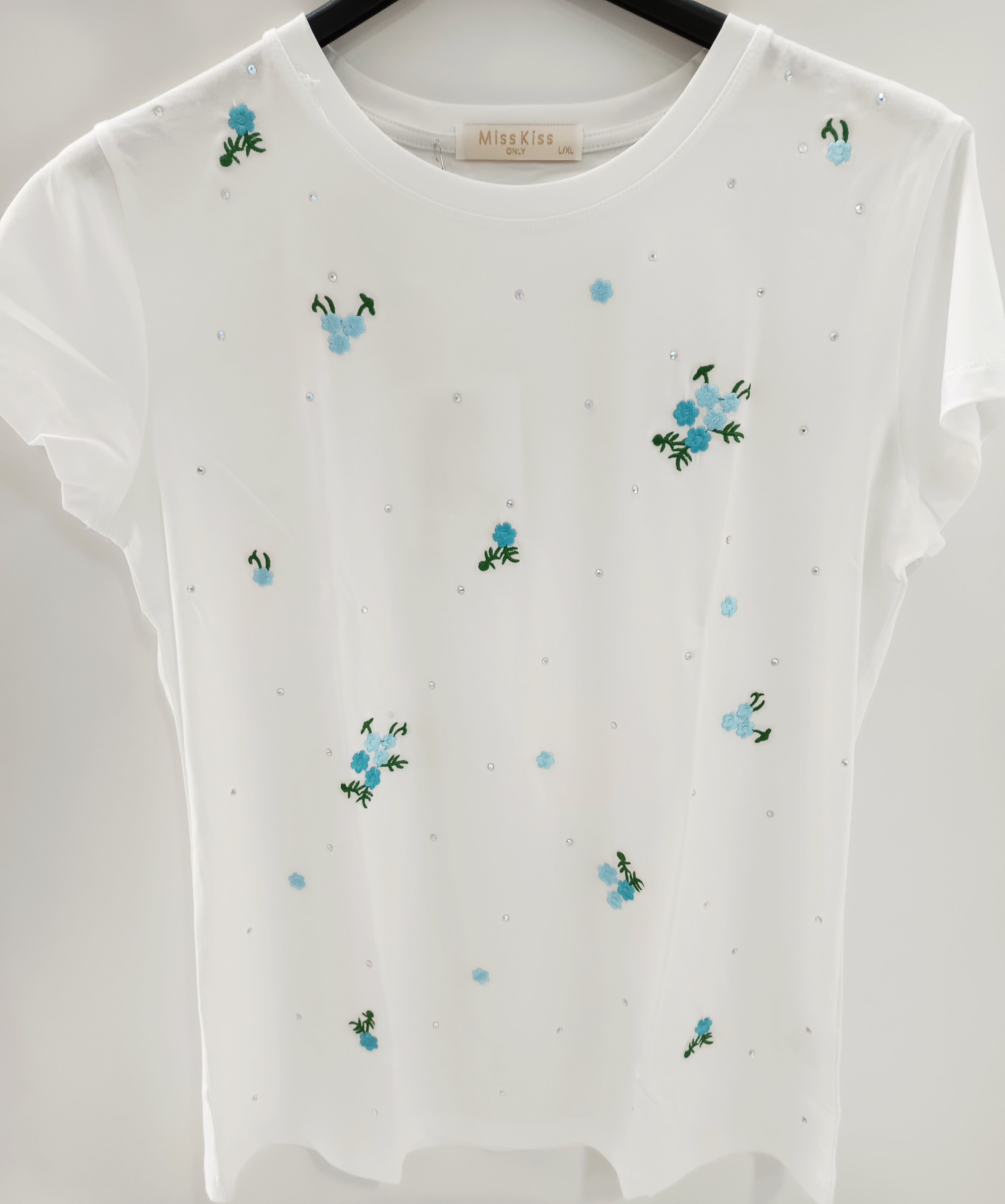 Camiseta bordada con flores y strass