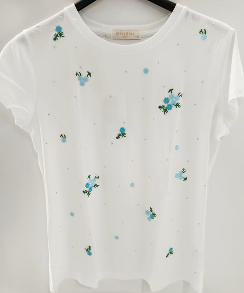 Camiseta bordada con flores y strass