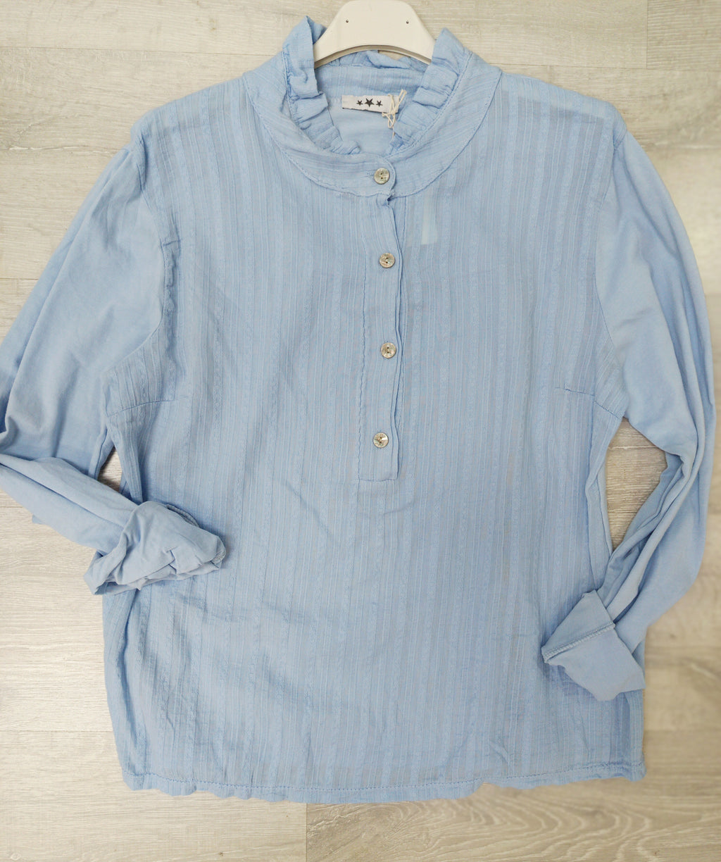 Blusa combinada con mangas de camiseta