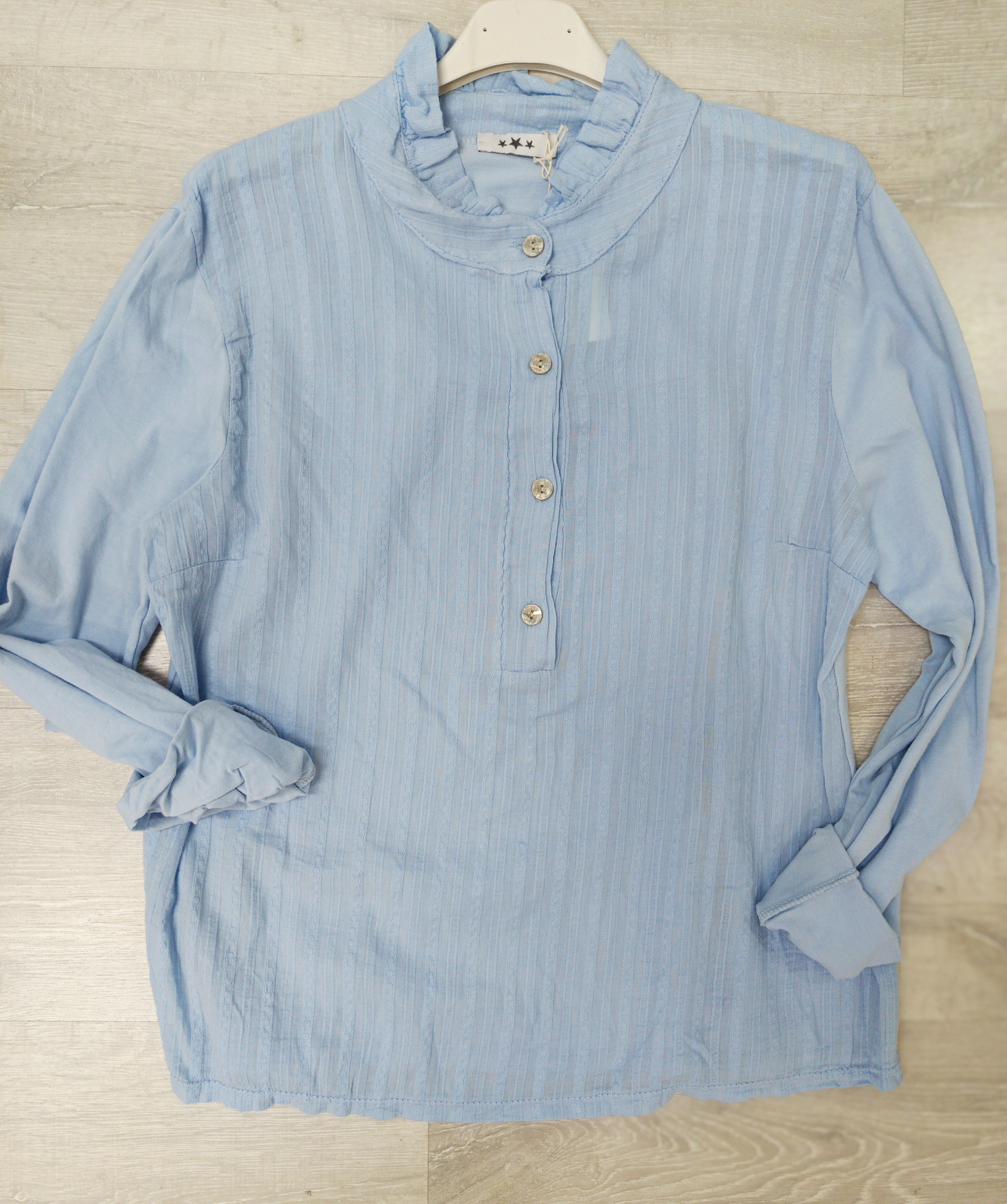 Blusa combinada con mangas de camiseta