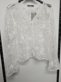 Camisa con bordados semi transparente