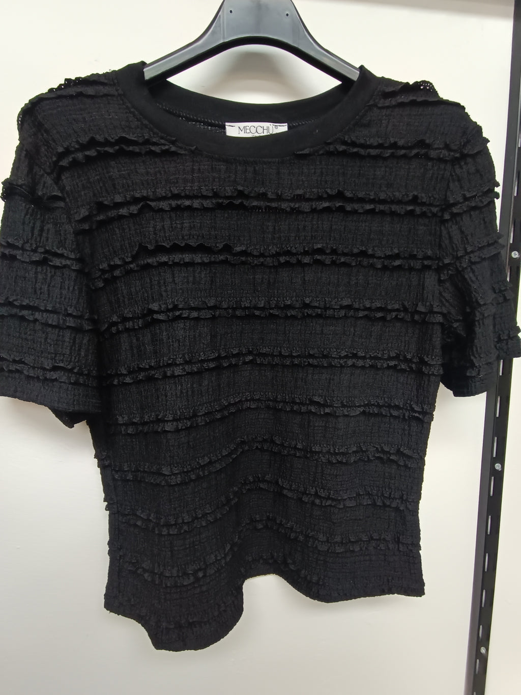 Camiseta con volantes
